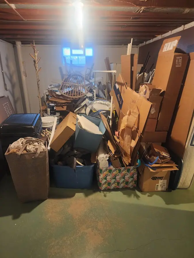 Roll-off dumpster container at job site for 2 Yard Dumpster Rental in Oxford